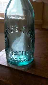 Carl "Charles" FEIGE - 1800s W. Feige & Son Pittsfield Mass. Aqua colored Soda bottle. Measures 7- 3/8 tall.