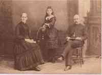 Mary Barker WILCOX - Mary Barker Wilcox Gimlich behind her parents. On the left is Elizabeth Pierce Paine Wilcox; on the right is William Edward Wilcox. Picture was taken